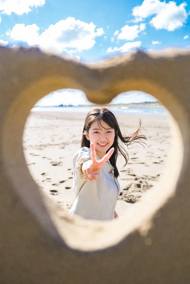Artful Beach Scene Merging Character and Sand Sculptures
