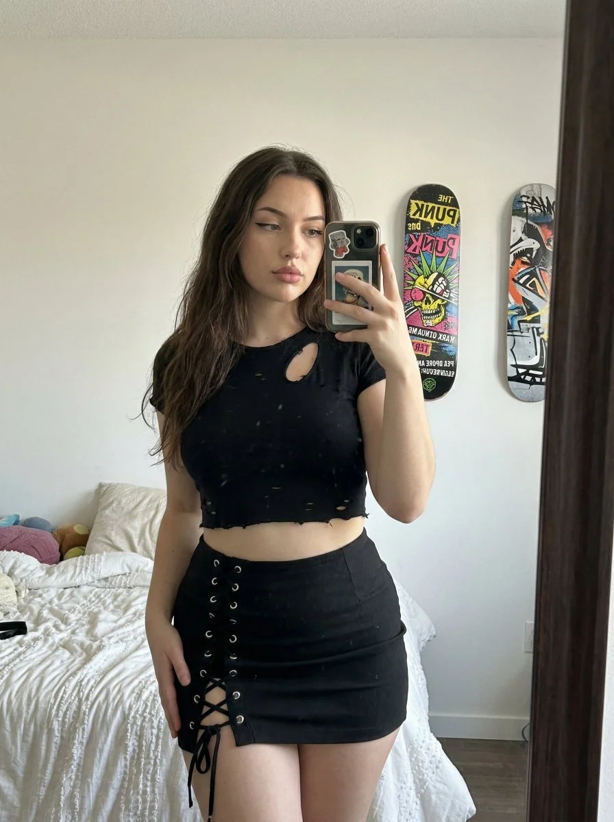 Authentic Mirror Selfie of Young Woman in Casual Black Outfit