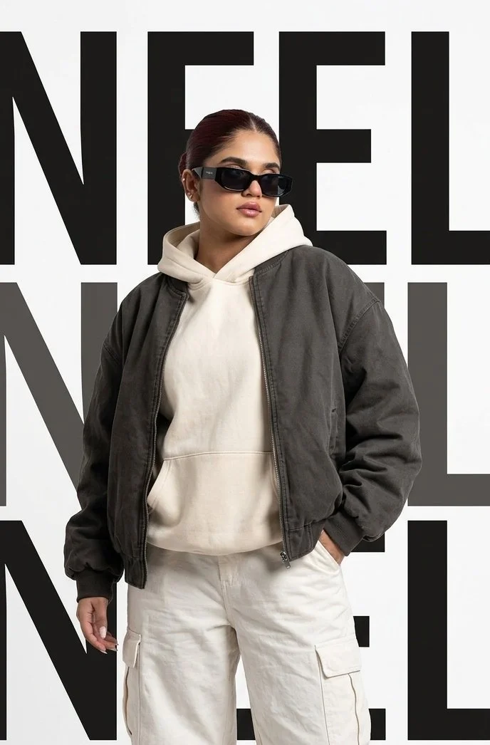 Bold typography frames a model in oversized Korean streetwear