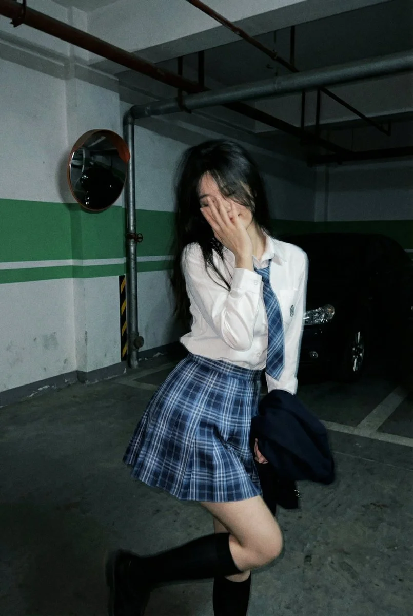 Candid Elegance: A Playful Encounter in Shadows