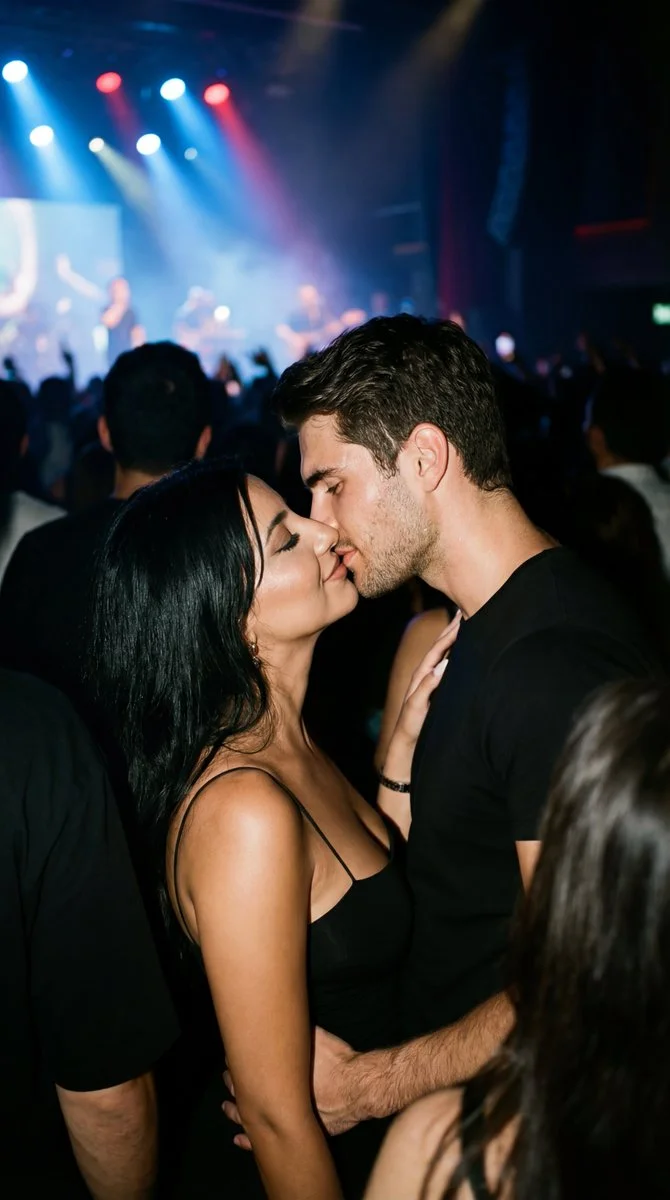Candid Kiss in Concert: A Moment in Istanbul