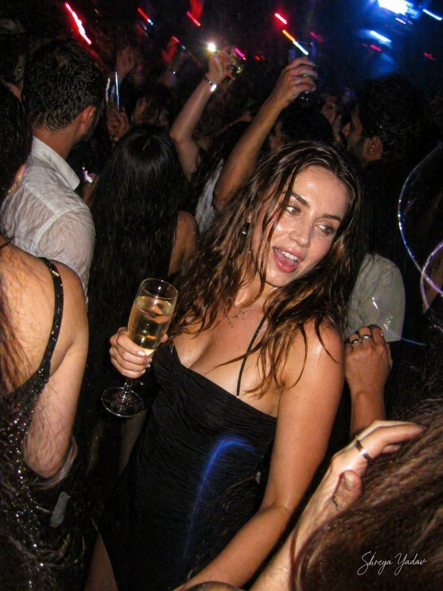 Candid Laughter Amidst Nightclub Chaos