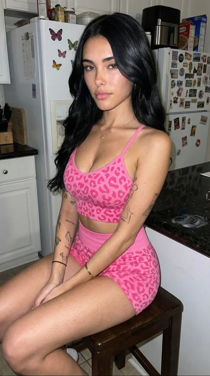 Casual Evening Glow: Athletic Style in a Cozy Kitchen Setting