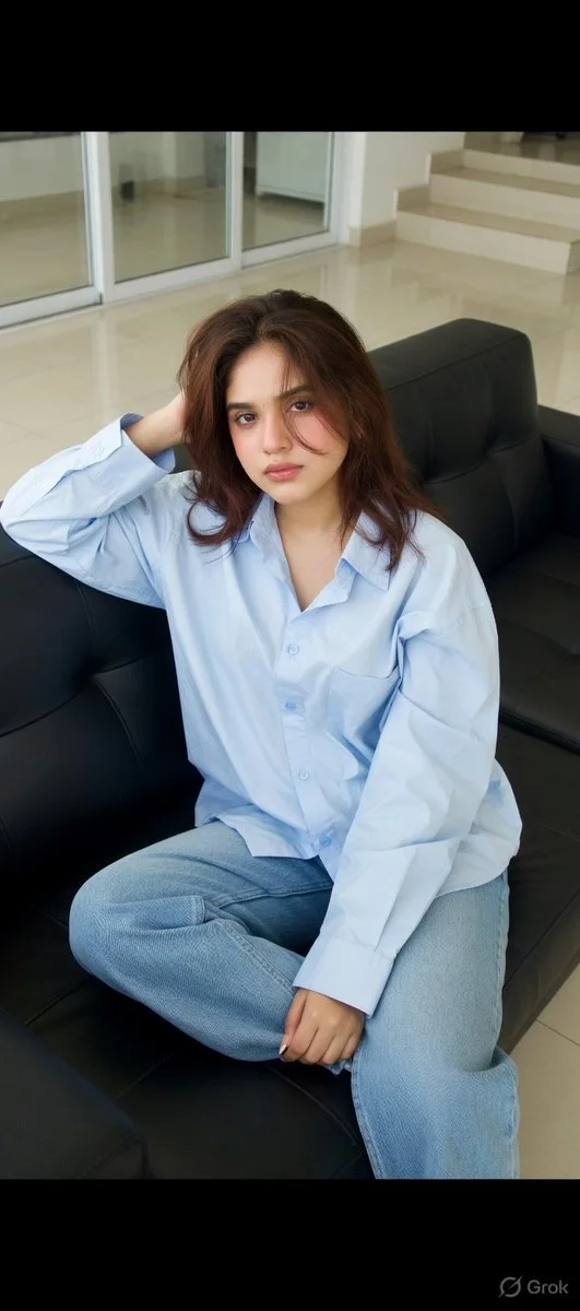 Casual Serenity: Young Woman Relaxing in a Modern Minimalist Living Room