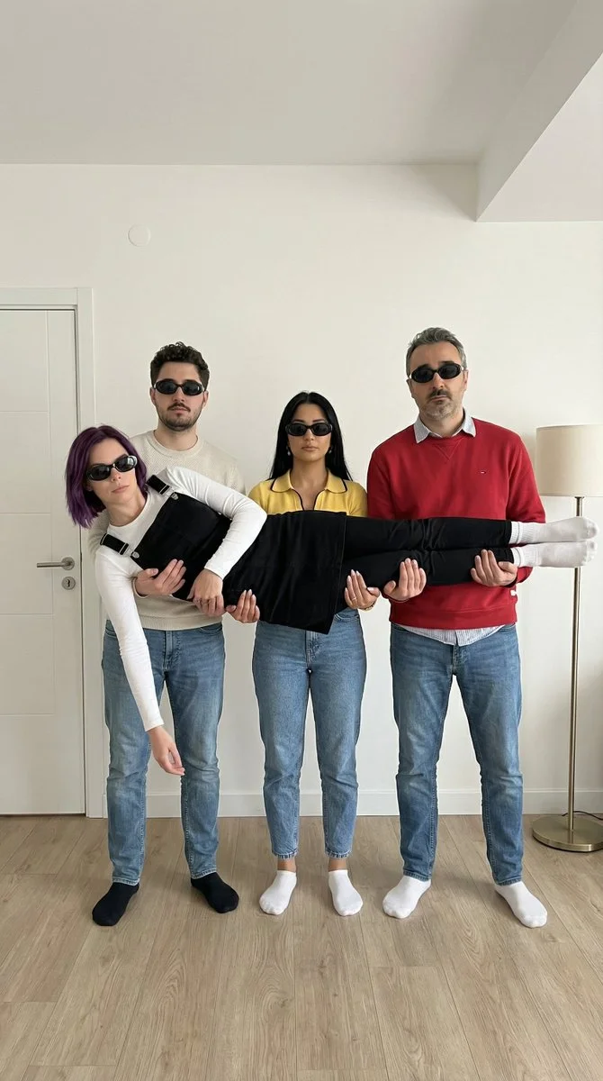 Chic Comedic Capture: Four Friends in Stylish Pose