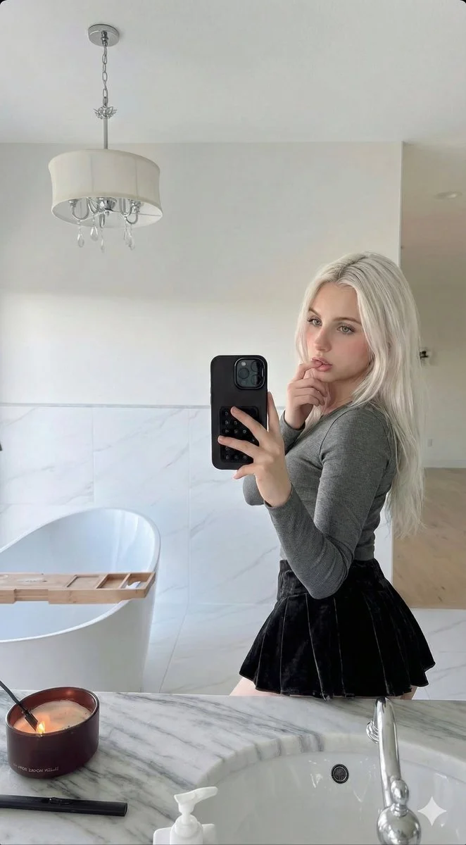 Chic Reflections: A Modern Bathroom Selfie