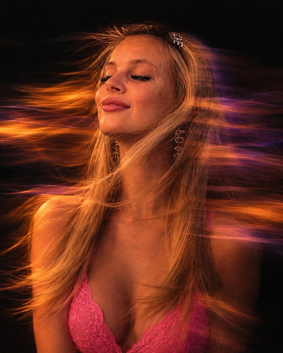 Cinematic Portrait Captures Motion Blur With Amber Violet Streaks
