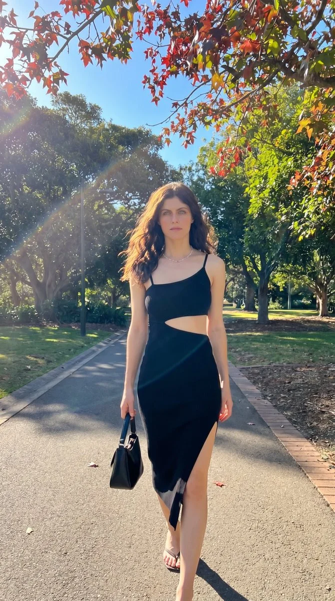 Confident Stride Through Sunlit Park Pathway