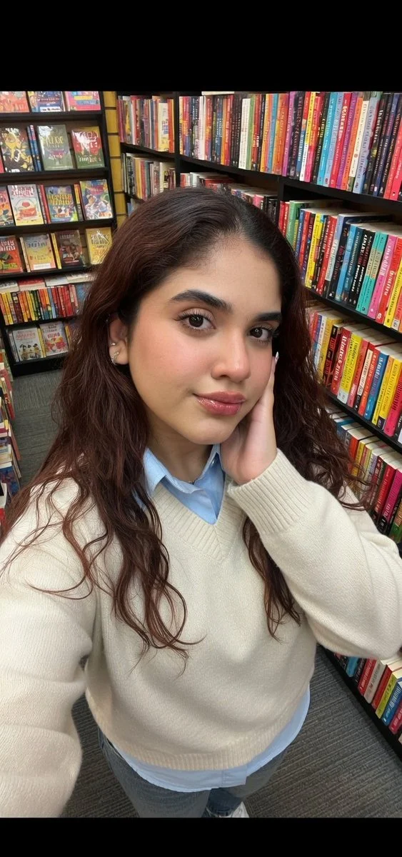 Contemplation and Color: A Moment in a Busy Bookstore