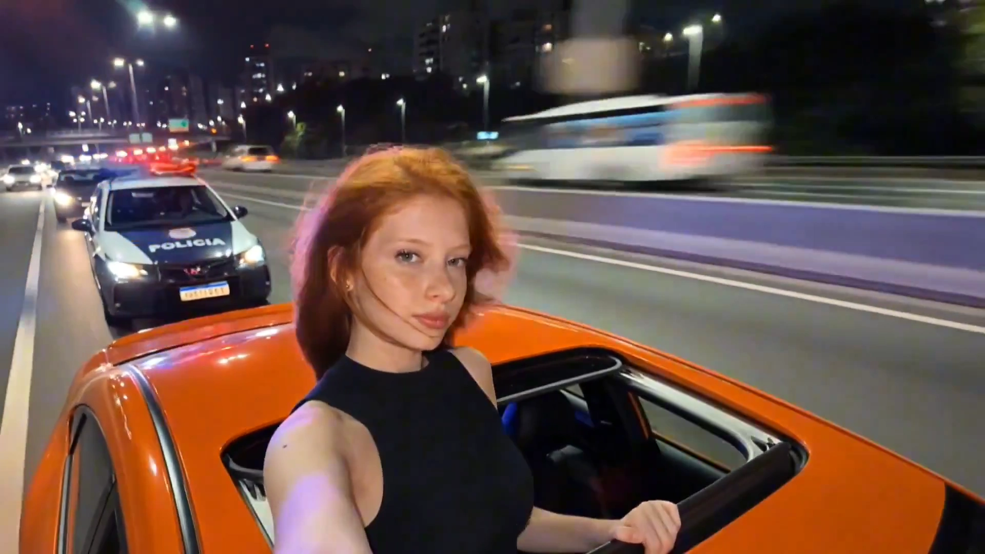 Red-Haired Racer vs Police in High-Speed Street Chase