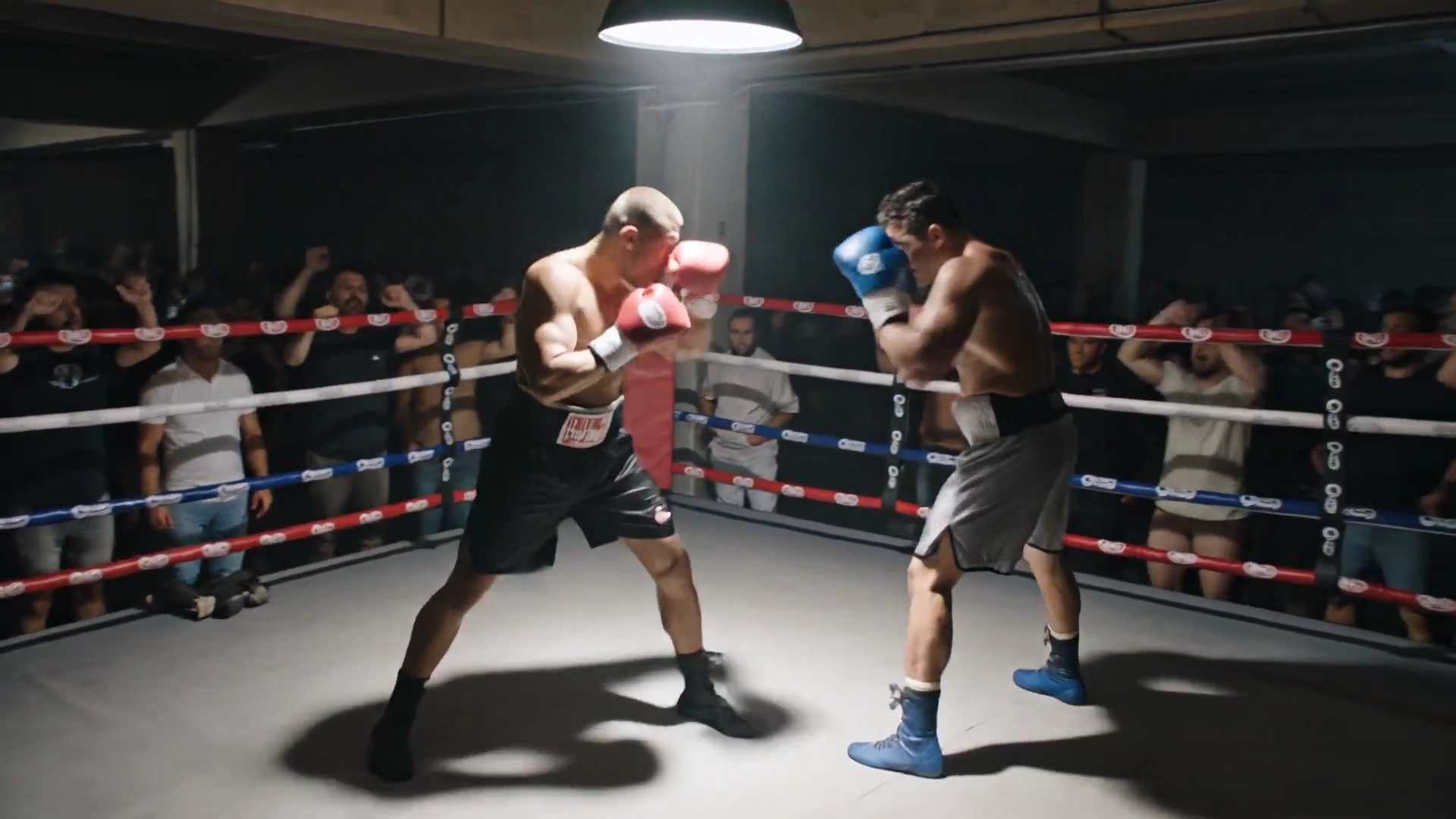 Sweat and Shadows: Fierce Combat in the Underground Ring