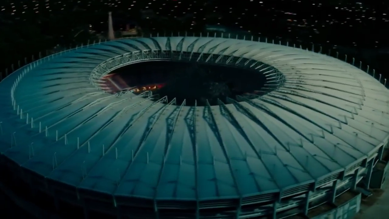 Dynamic Kaiju Emerges Amid Stadium Destruction