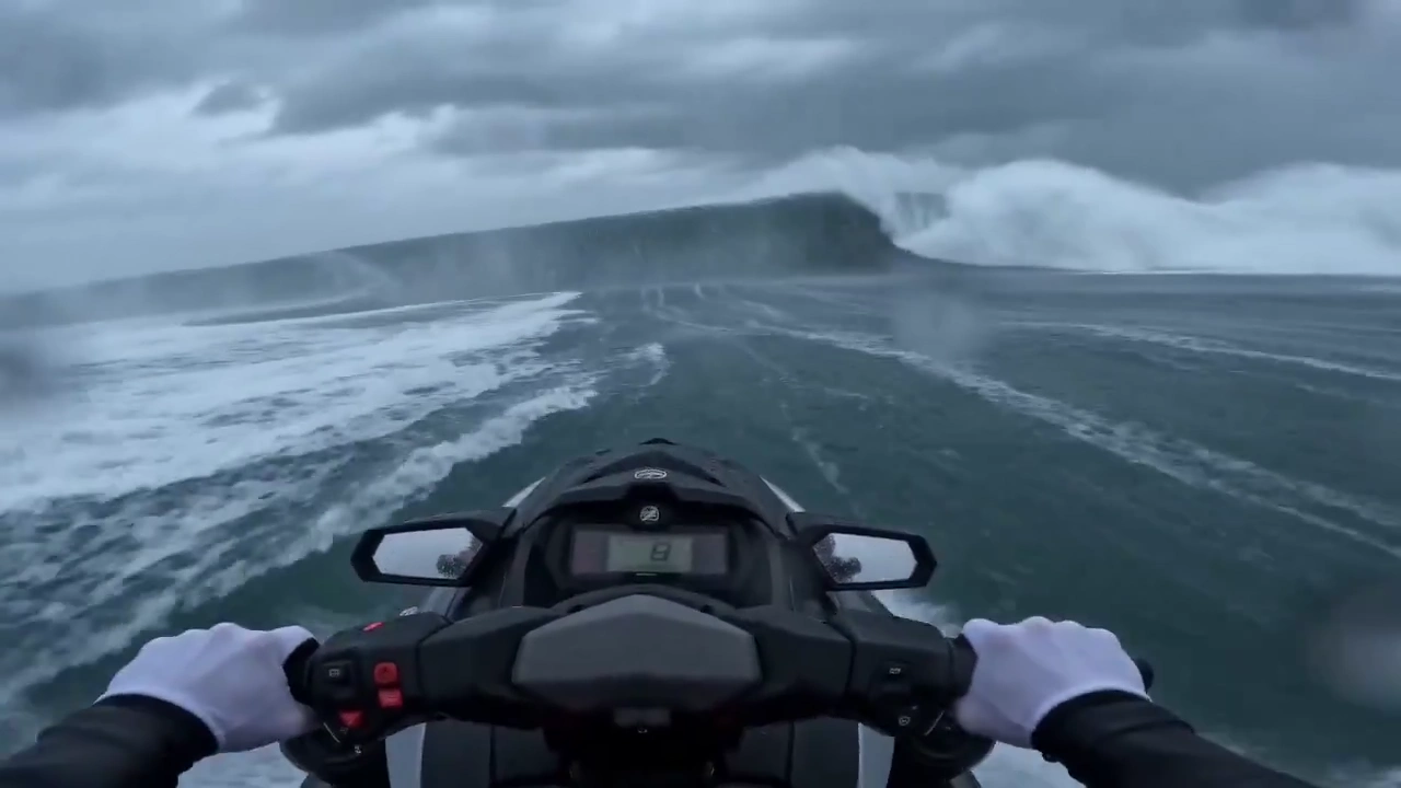 Storm-Chased Jet Ski Ride Over a 50-Foot Ocean Wall