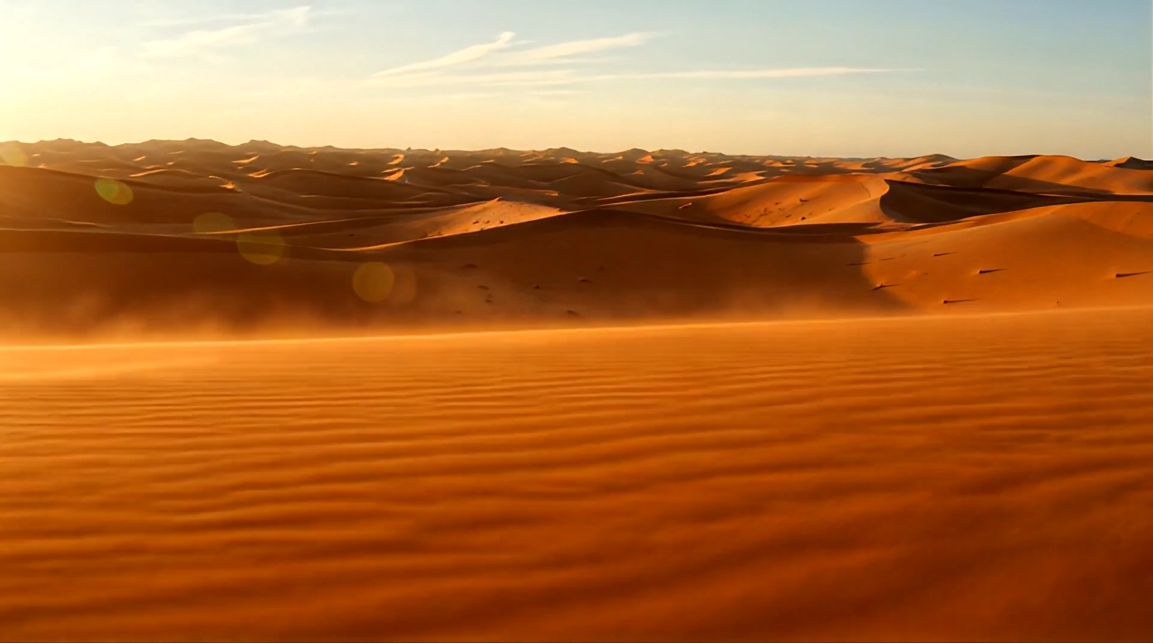 Golden Dunes Unfold: A Fluid Sunrise Ride Through the Desert