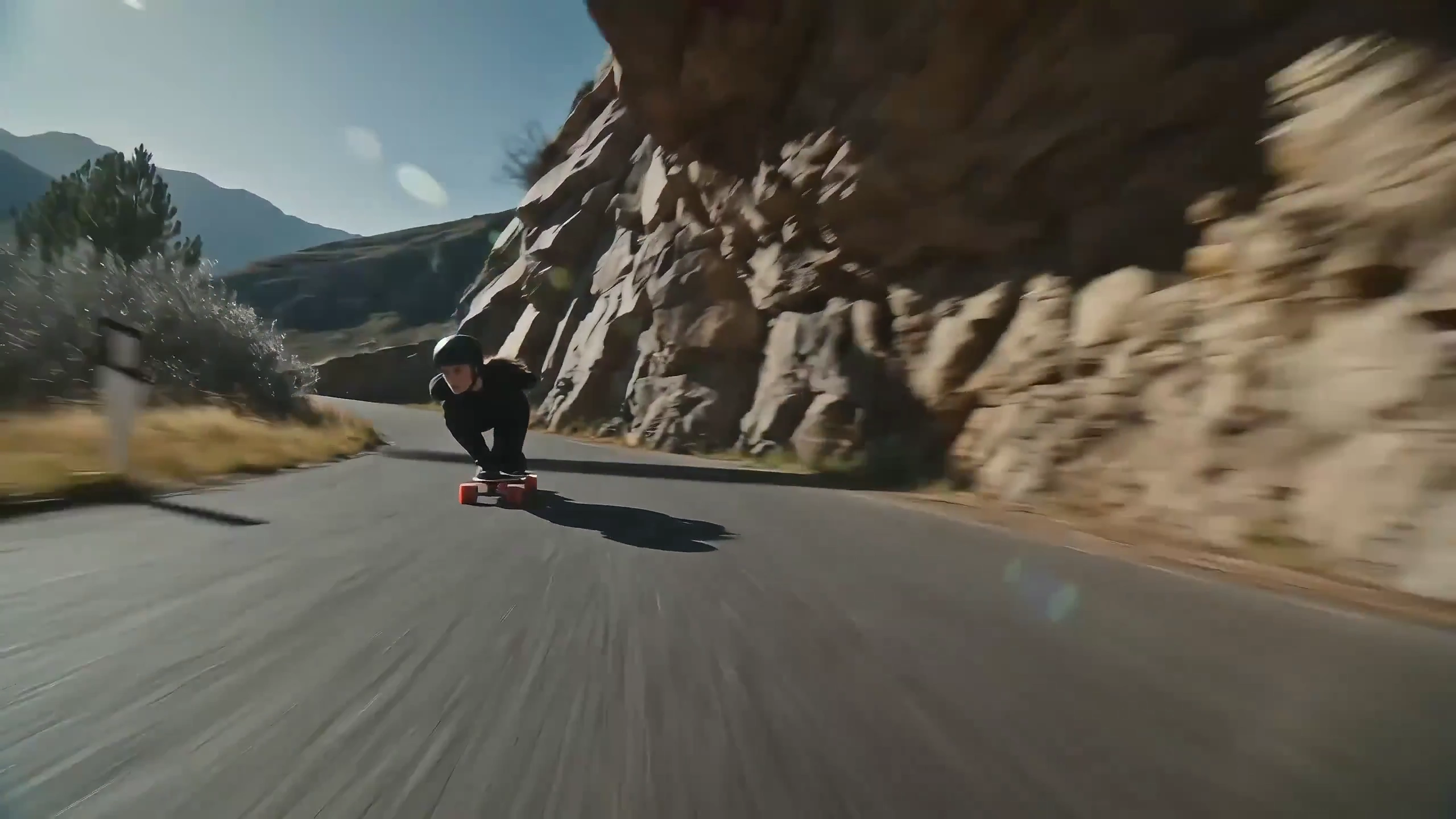 Intense Mountain Longboarding Captured Through Dynamic Shadows and Close-Up Smoke