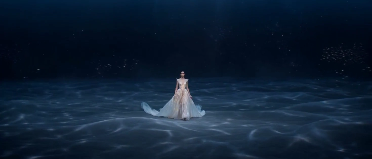 Surreal Oceanic Couture: Slow-Motion Elegance in a Dreamlike Setting