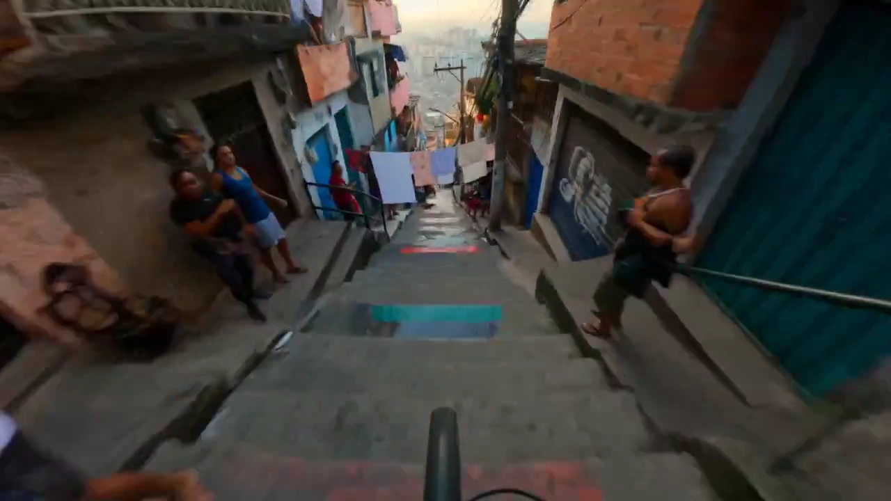 Adrenaline-Fueled Descent: A Hyperreal 360-Staircase Bike Chase