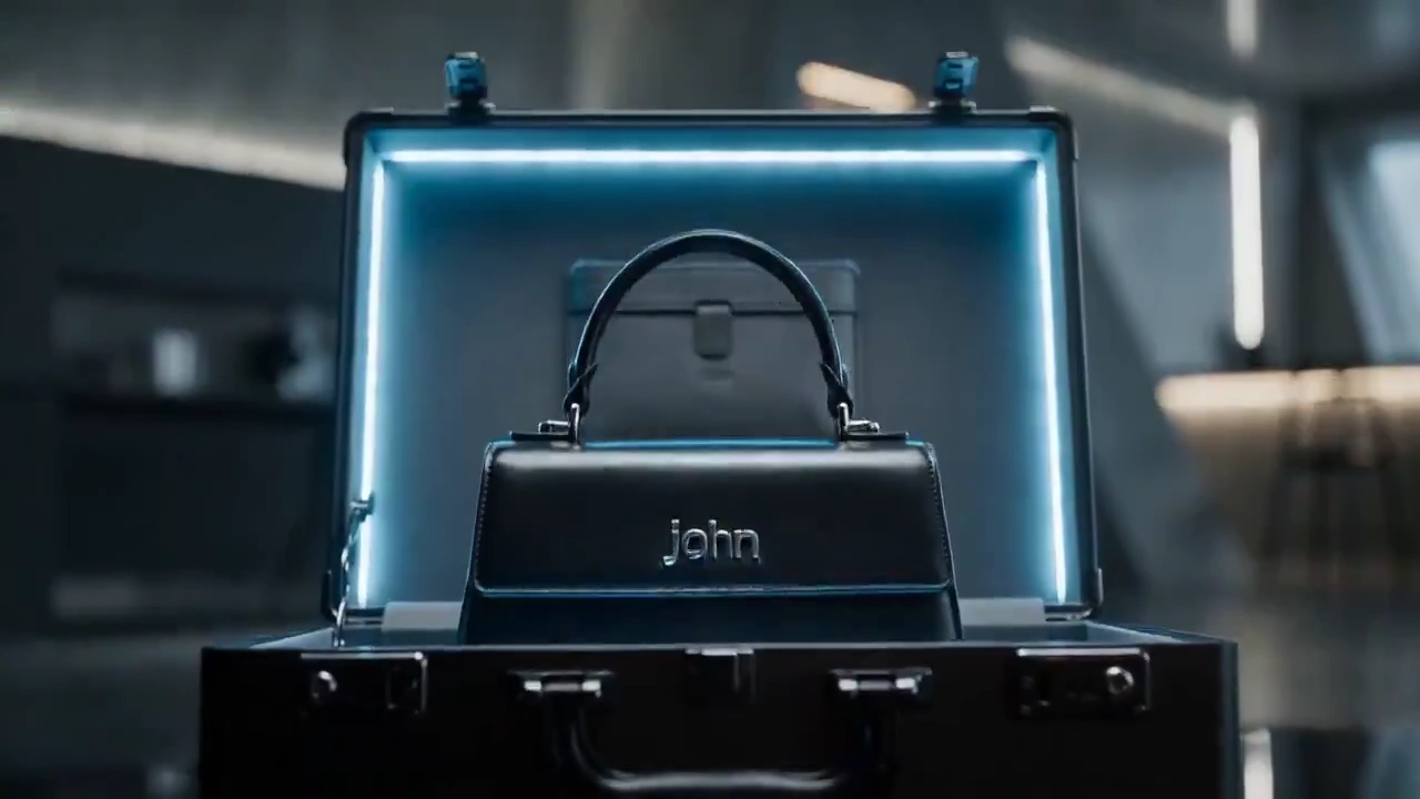 Cinematic Montage Showcasing the John Ladies' Bag in Futuristic Detail