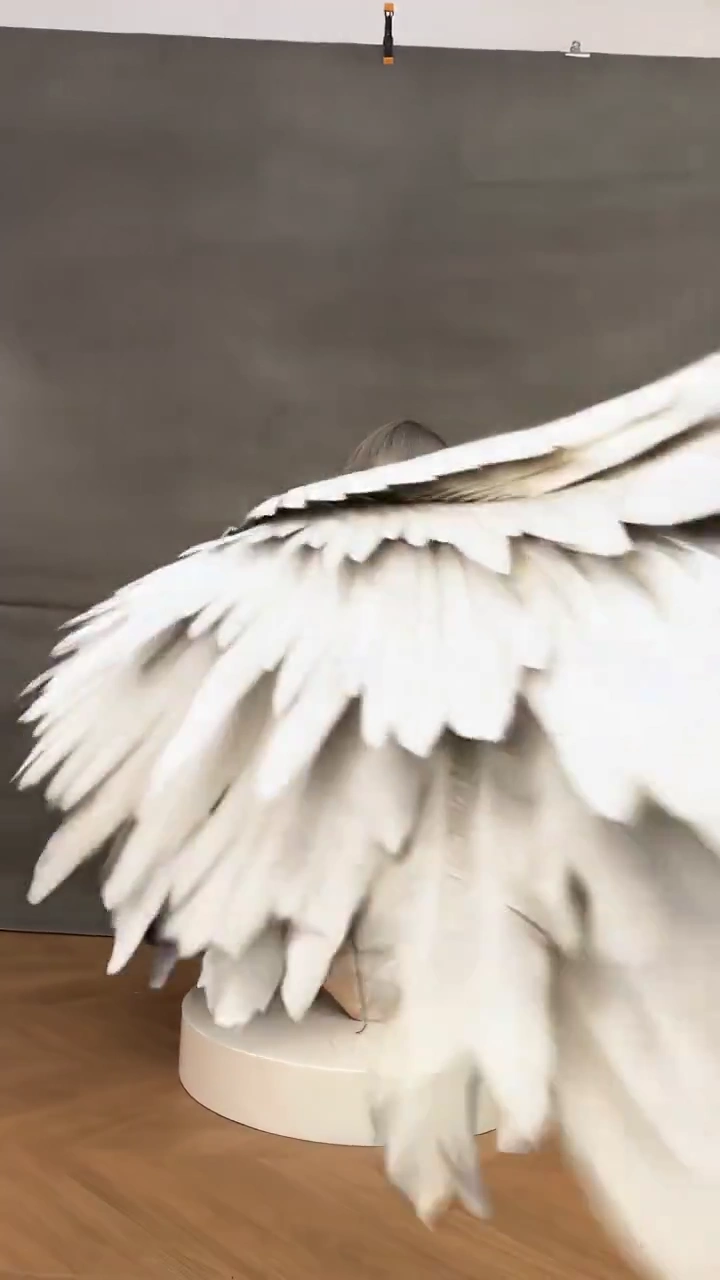 Masterpiece 8K Render of a Glowing Archangel in Dark Atmospheric Setting