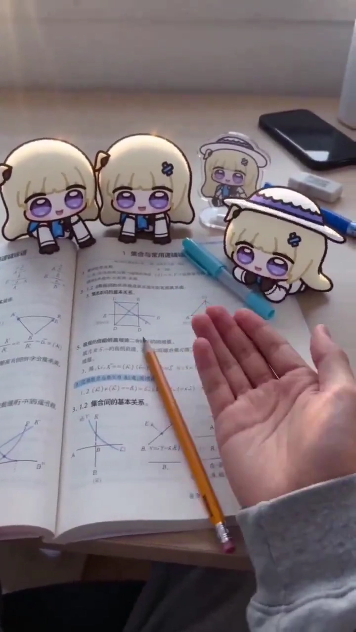 Adorable Anime Study Buddy Lights Up a Warm Wooden Desk Space