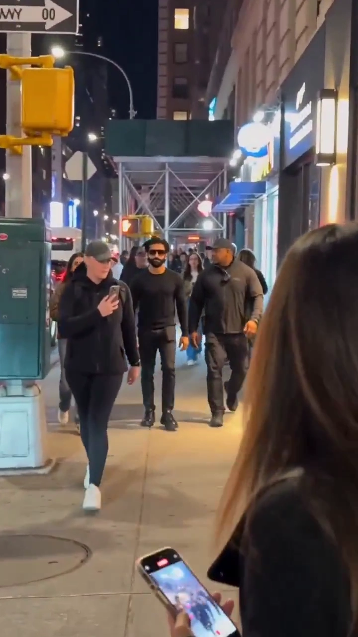 Raw iPhone Clip Reveals Star's Calm Walk Past Stunned Fans
