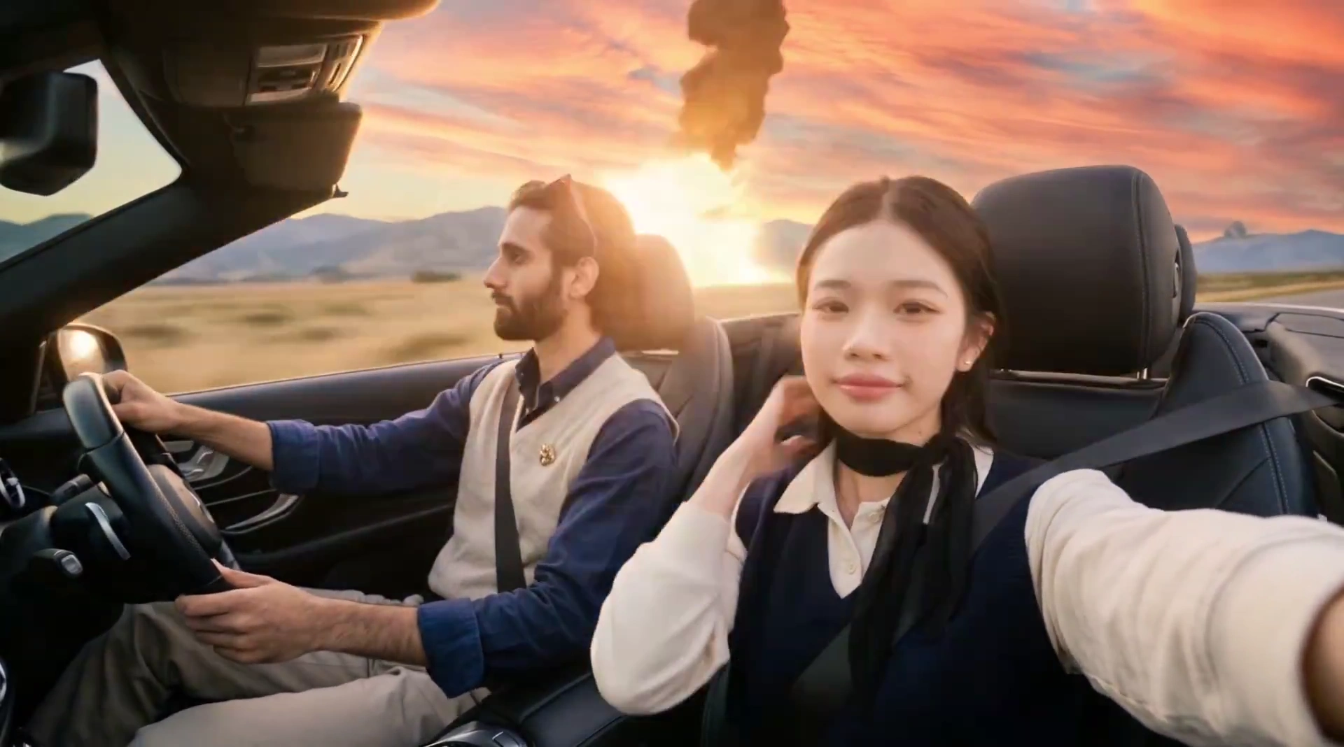 Lovers Embrace in Convertible as Fireball Rises Over Horizon