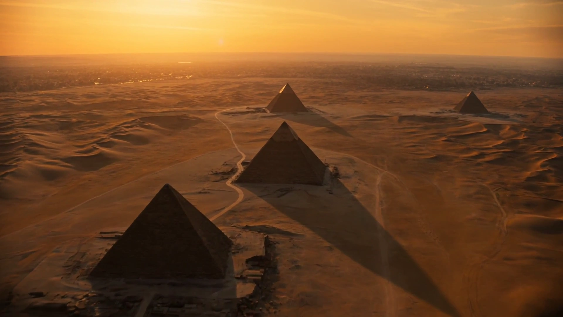 Colossal Sandstorm Surges Across Desert While Pyramids Remain Steadfast