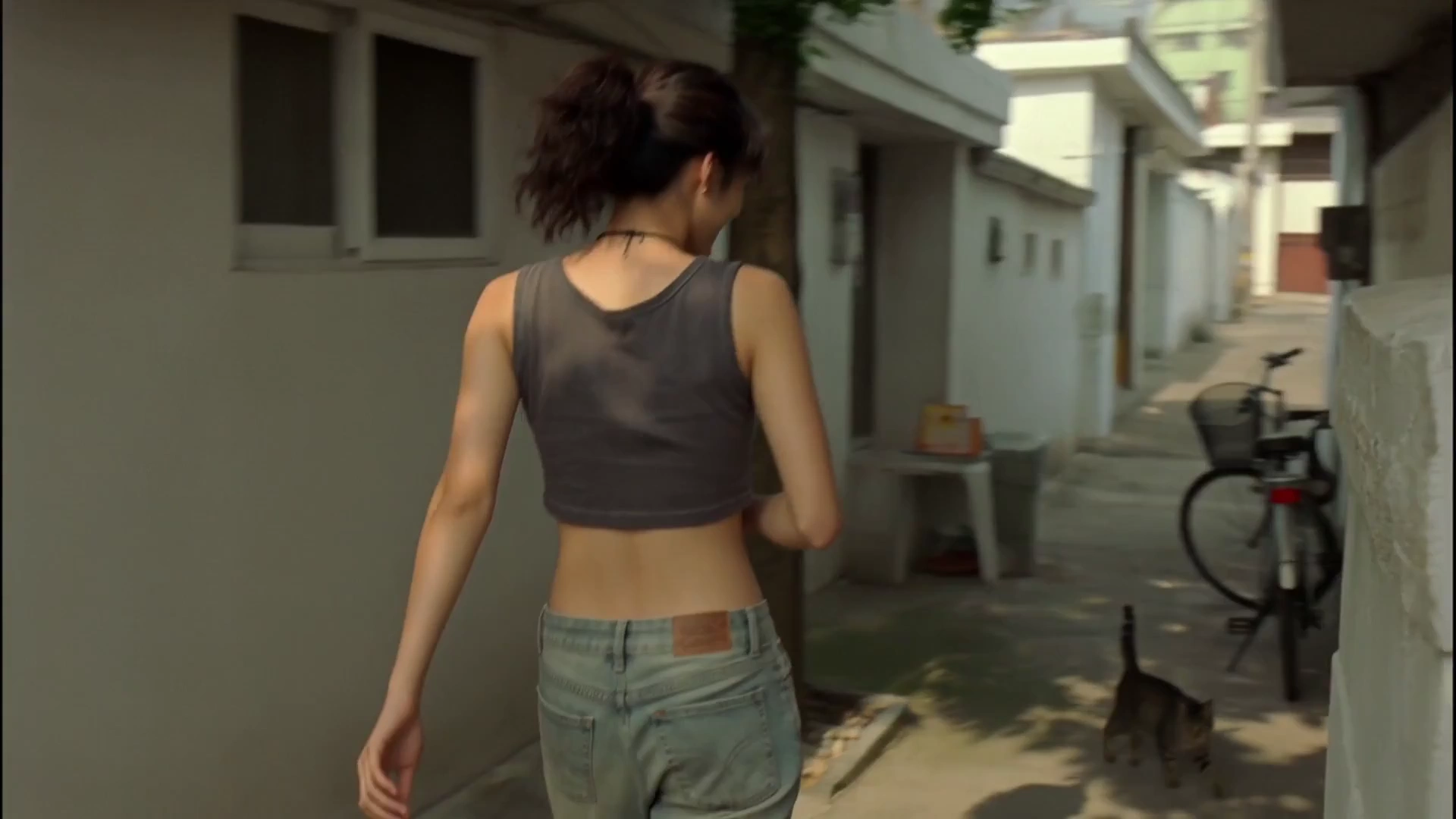 Handheld DV Cam Follows a Girl on a Sunny Morning