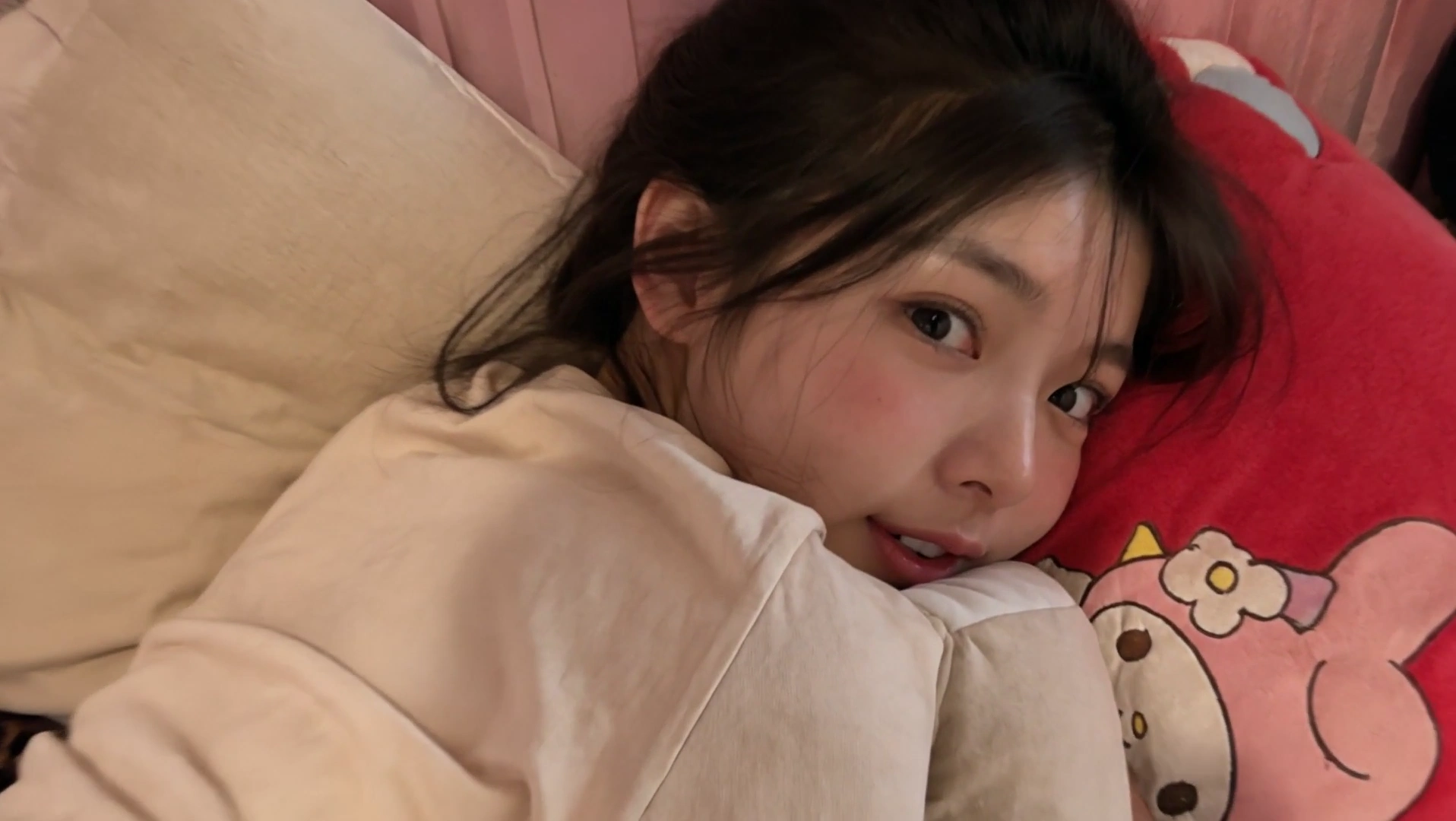 Girl Plays Peek-a-Boo While Snuggling on Leopard Sheets