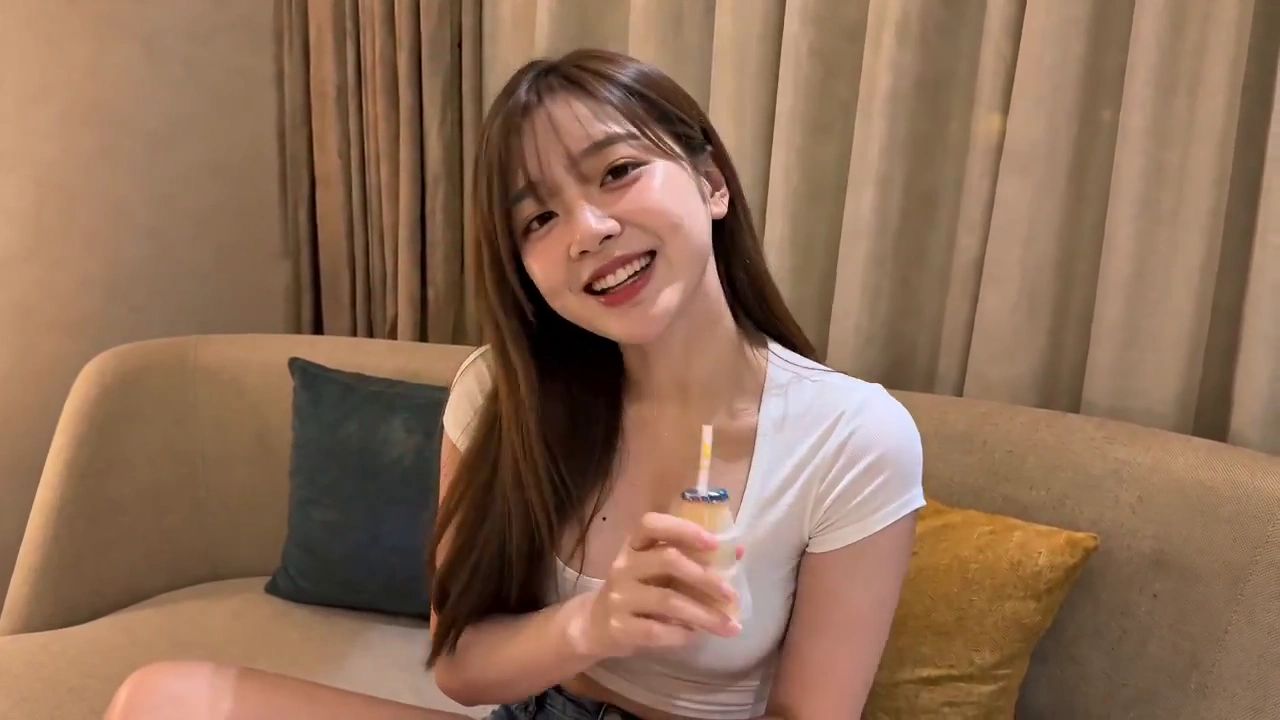 Playful Girl Shows Off Outfit with a Spin and Jump