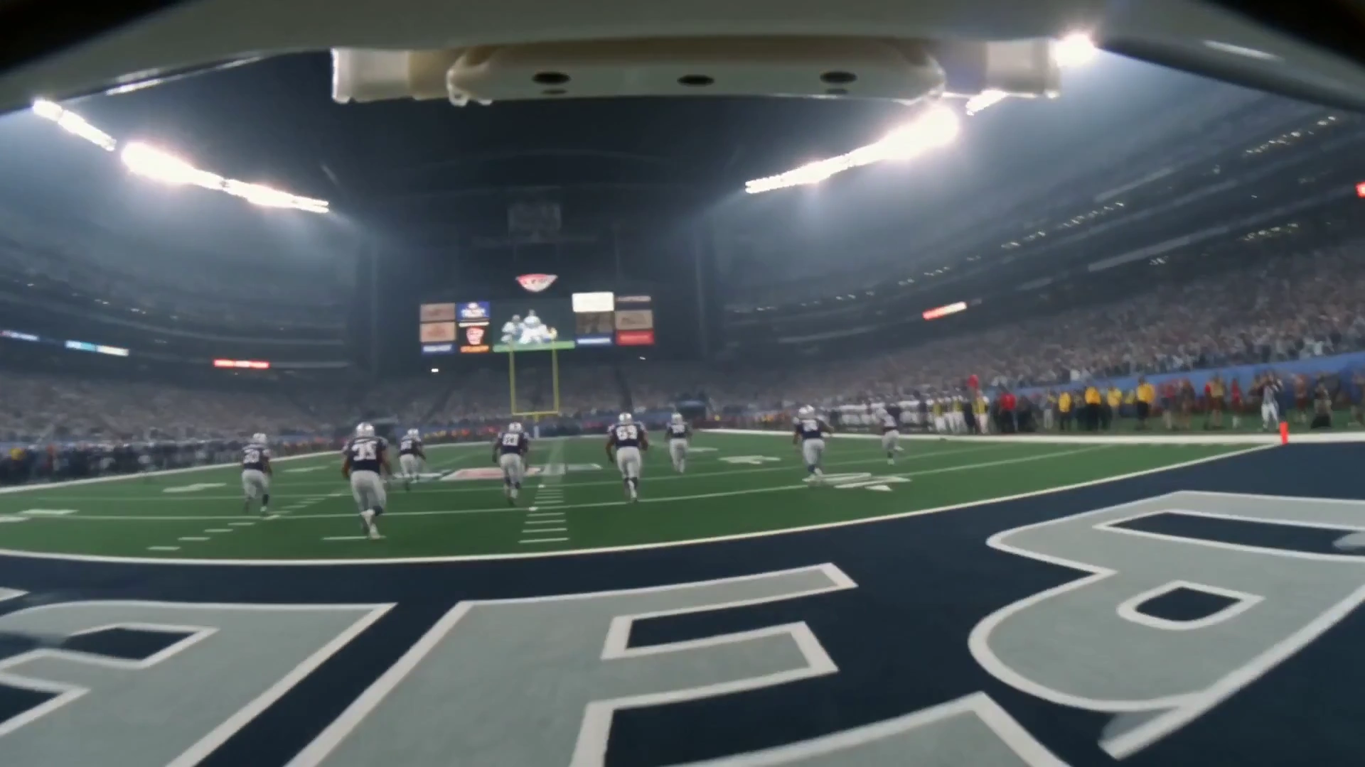 First-Person Football: Gloved Hands Catch the Winning Pass