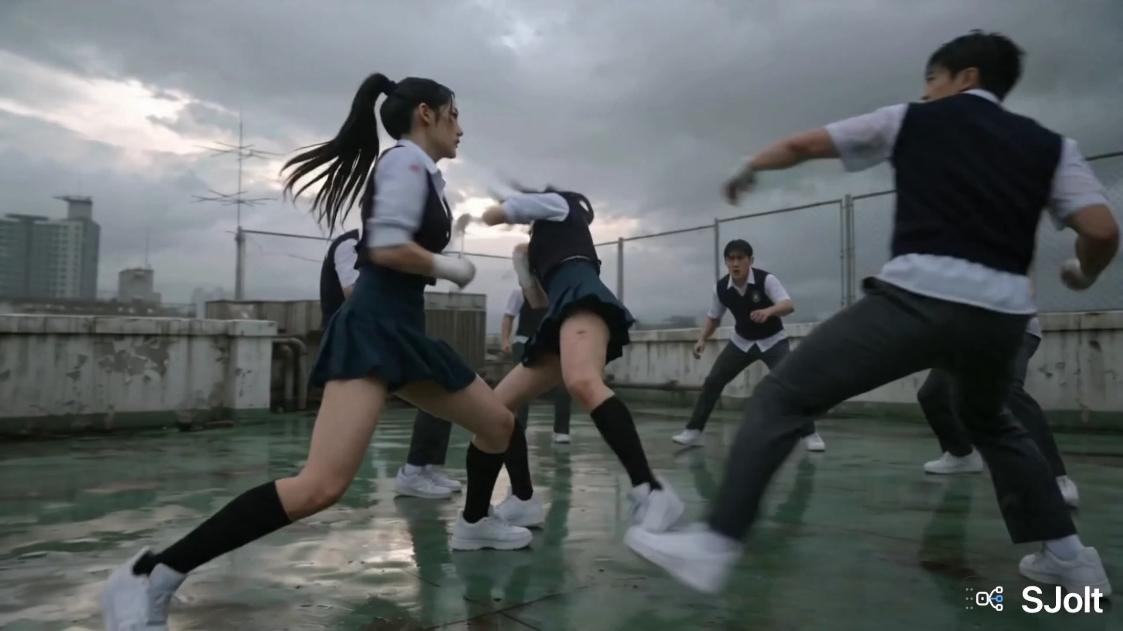 Rain-Soaked Rooftop Brawl Ends With One Girl Standing