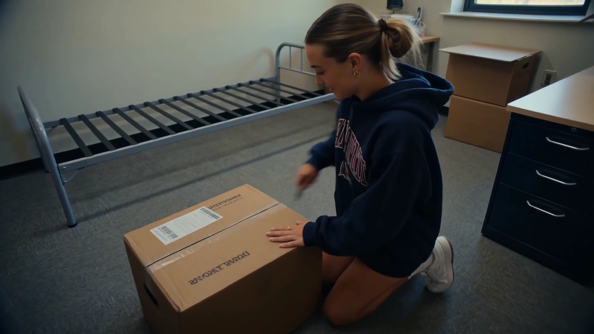Student Films Dorm Setup with Nostalgic Mini DV Camcorder