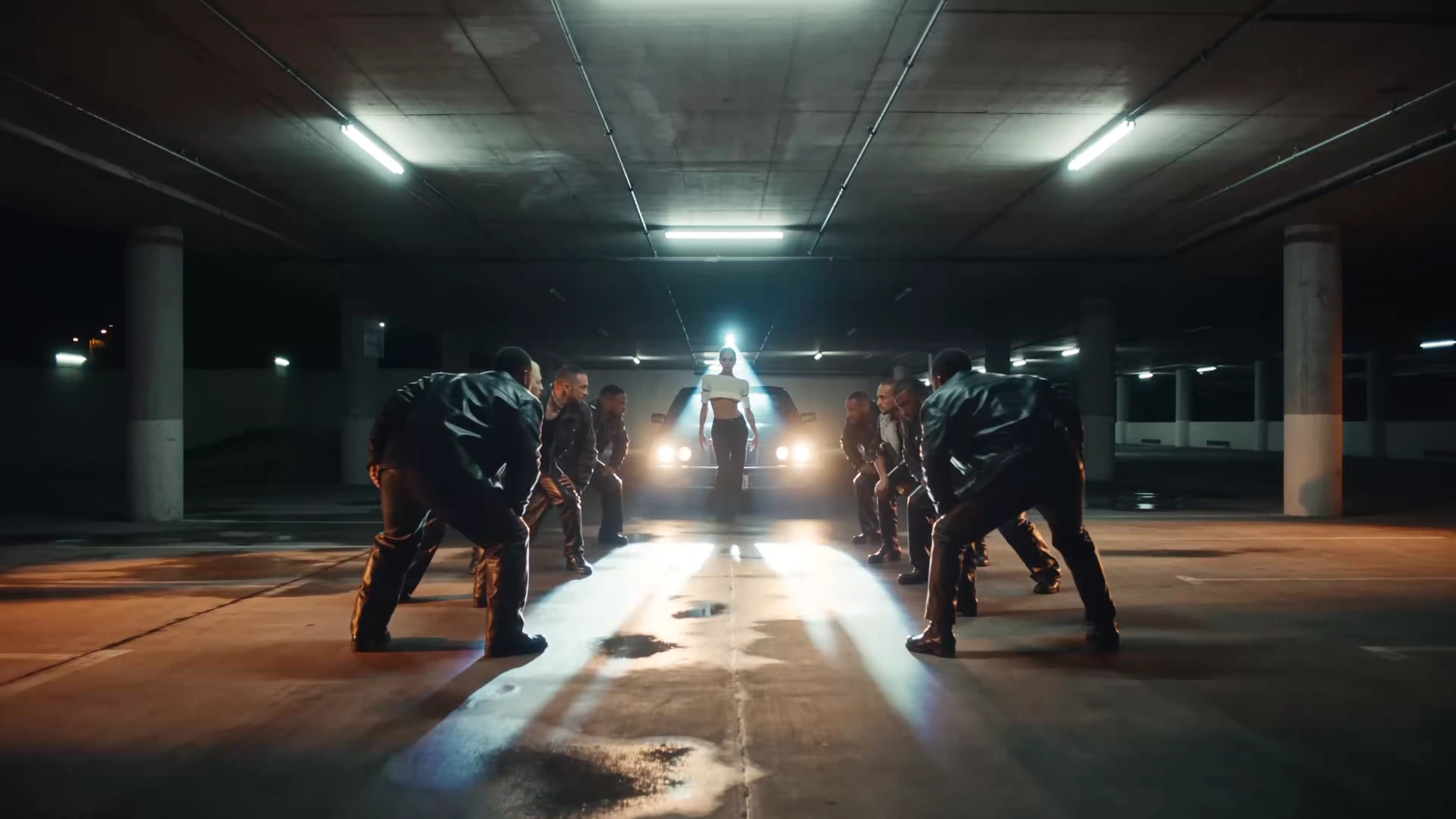 Crisp Vogue Moves Illuminate an Underground Parking Garage Runway