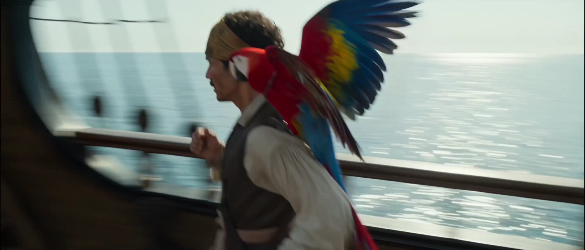 Black-Sailed Pirate Ship Emerges on Horizon as Captain Stares Silently