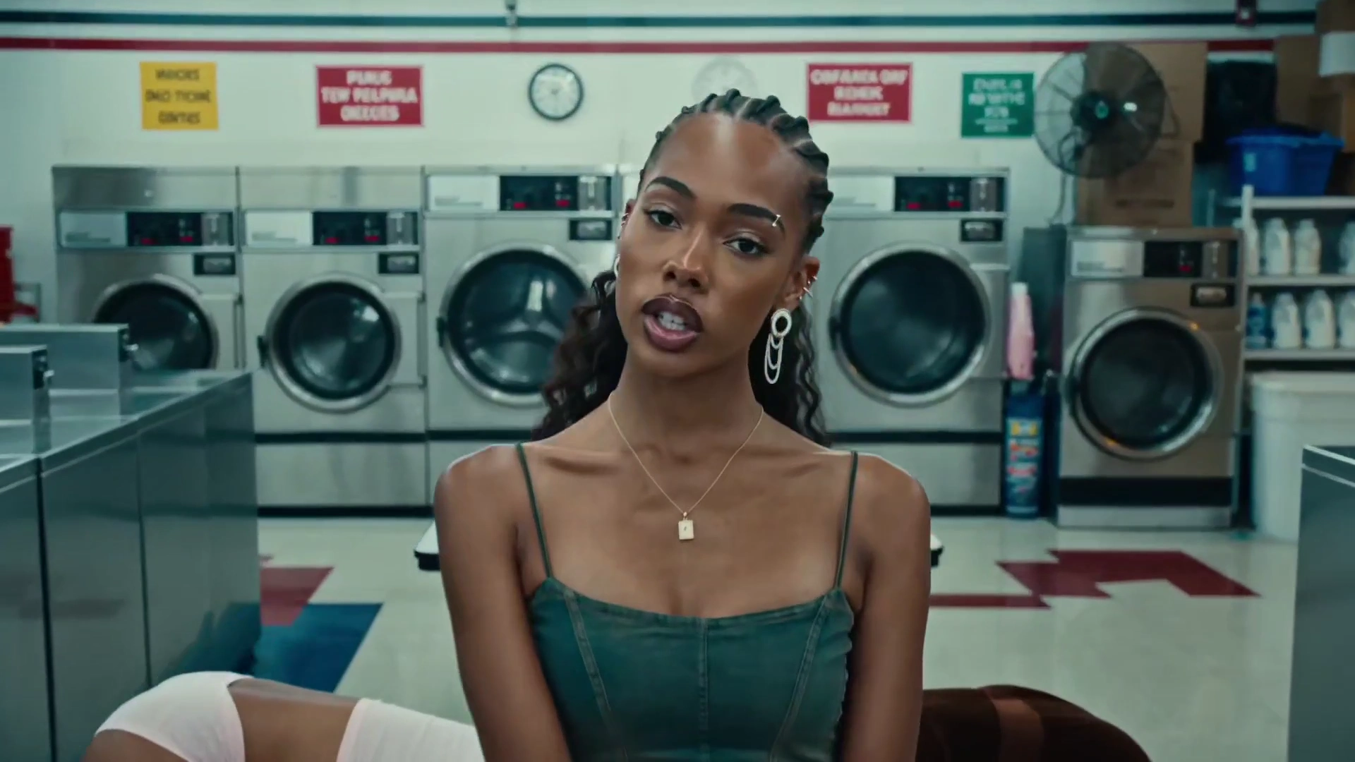 Crash Zooms Follow a Rapper Through a Neon-Free Laundromat Performance
