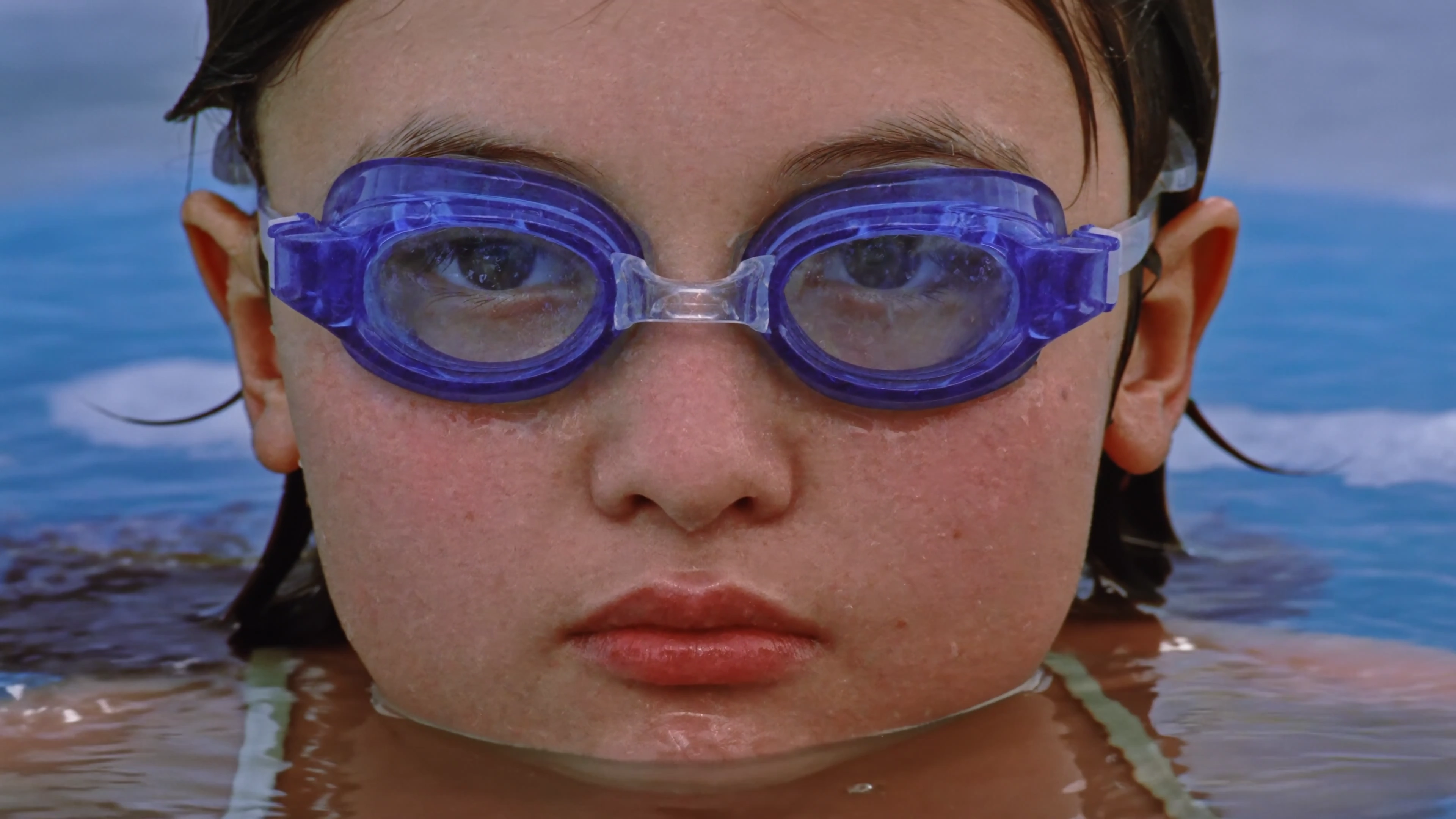 Flooded Breakroom Chaos Centers on a Stoic Swimmer
