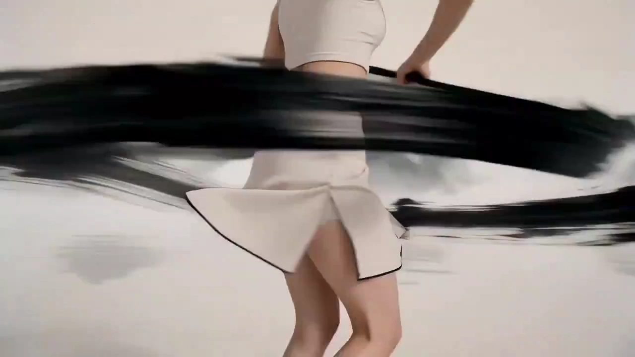 Martial Arts Meets Calligraphy: Ink Splashes Under Golden Light