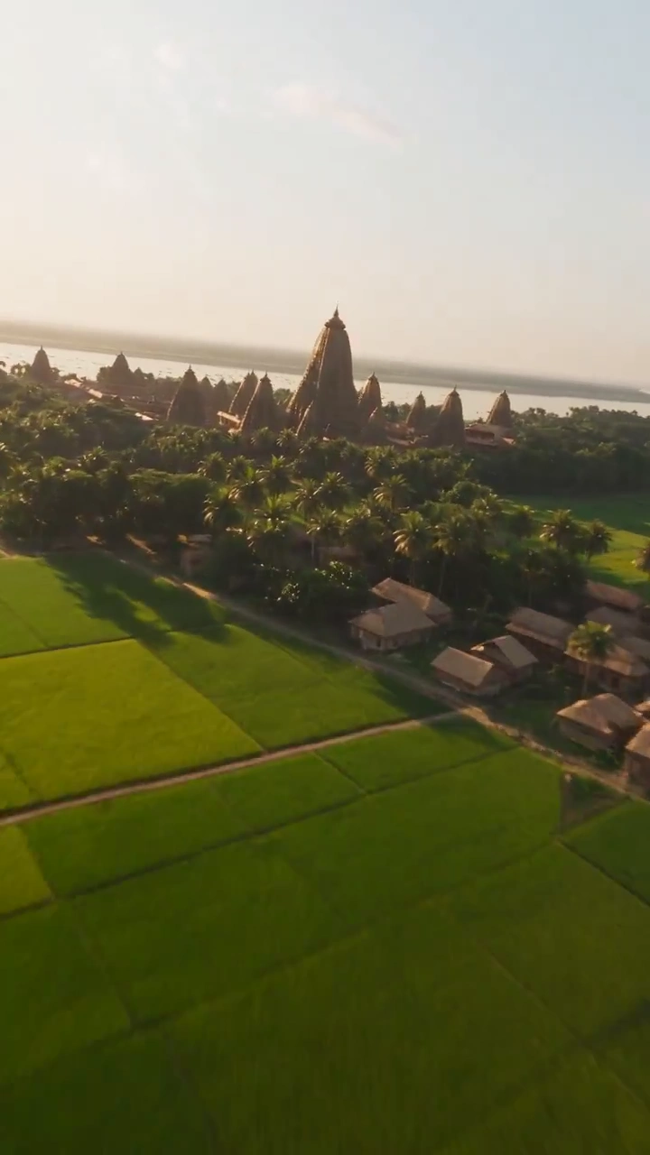 Unbroken Drone Dive Across Sena-Era Palaces and River Delta