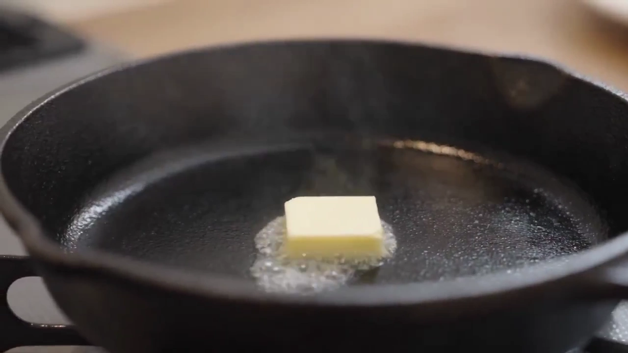 Golden Omelet Slices Open Over Rice in Home Kitchen