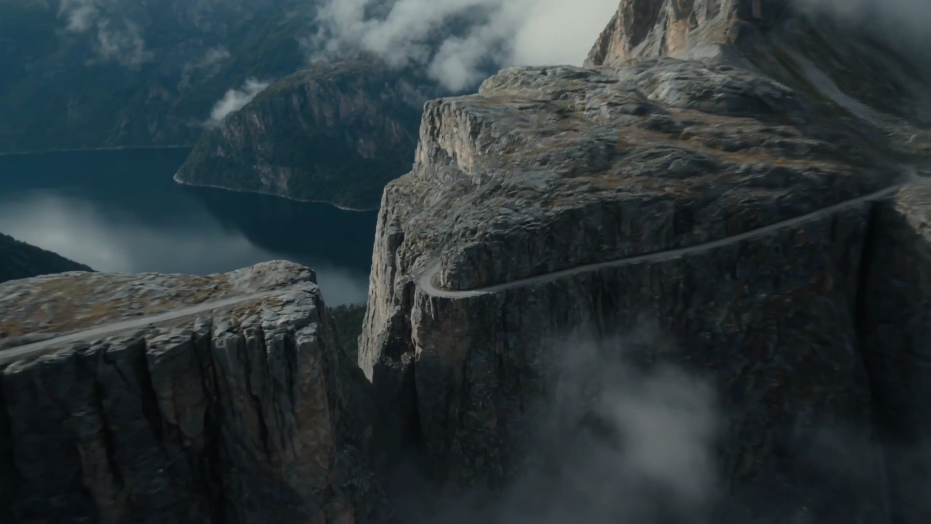 Rollerblader Braves a Narrow Cliffside Trail in High Winds