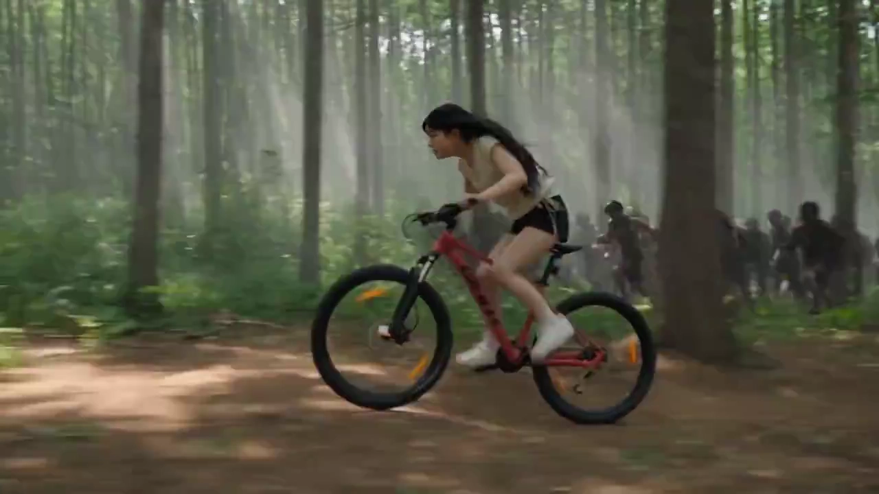 Woman on Red Bike Outruns Shadows in Misty Woodland
