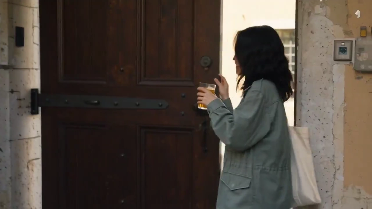 Nostalgic VHS-Style Walk Captures Peach Bites and Cobblestone Charm