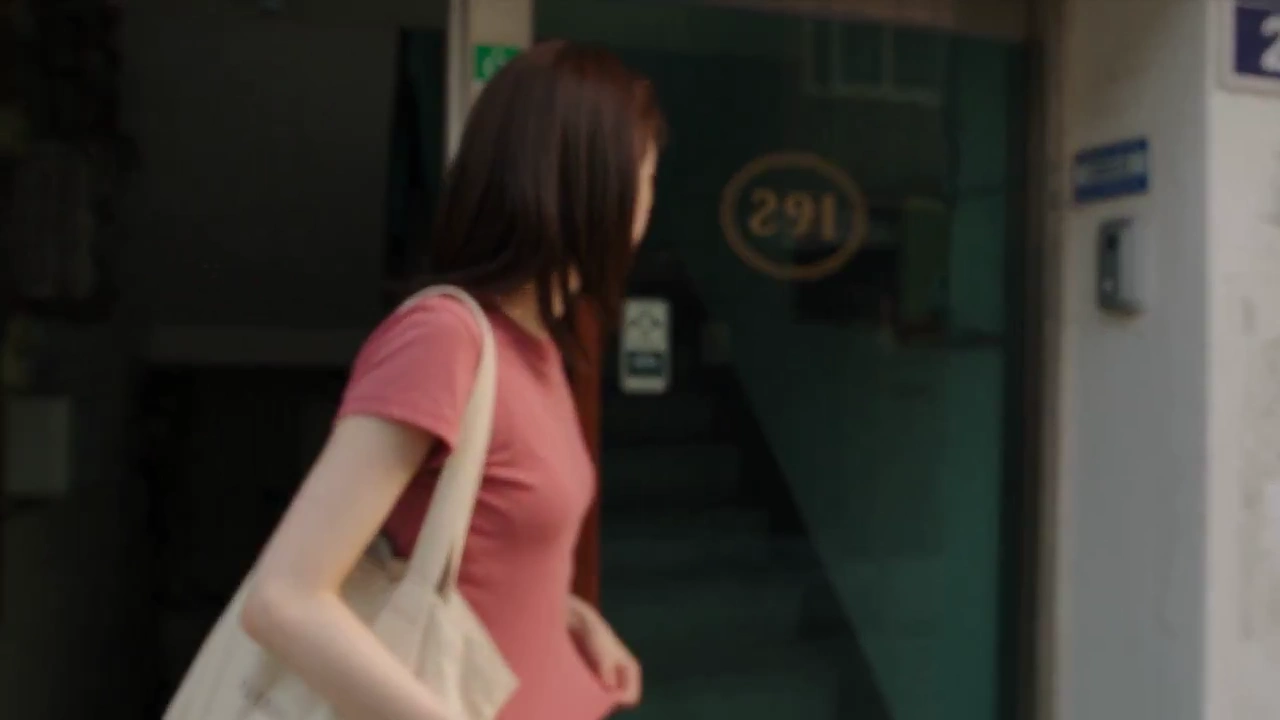 Summer Breeze Blows Petals Onto Girl in Faded Seoul Neighborhood Video