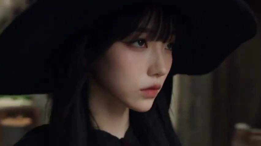 Dark Witch Calmly Faces Camera as Water Vortex Saves Burning Village