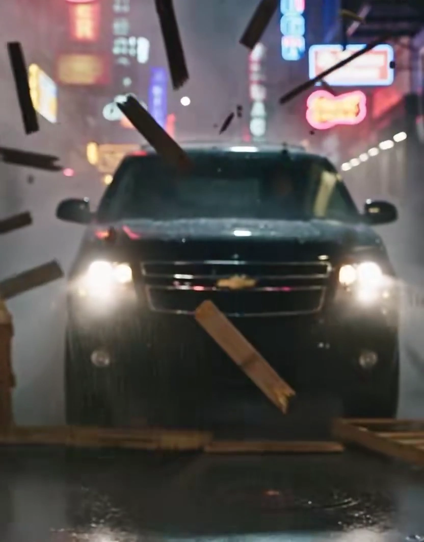 Determined Rider Outruns SUV In Rain-Drenched Neon City Chase