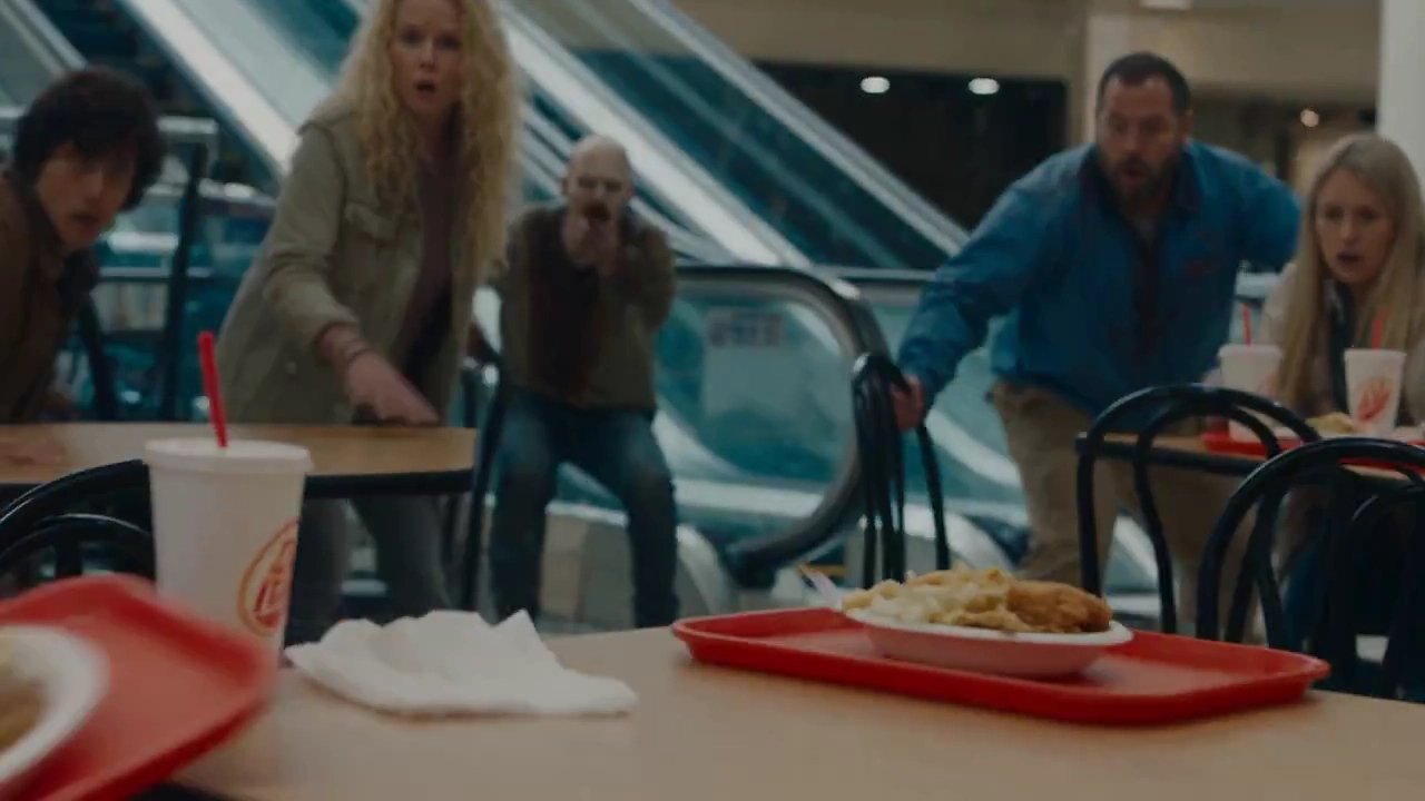 Escalator Chaos Unfolds as Survivors Battle Infected with Mannequins and Carts