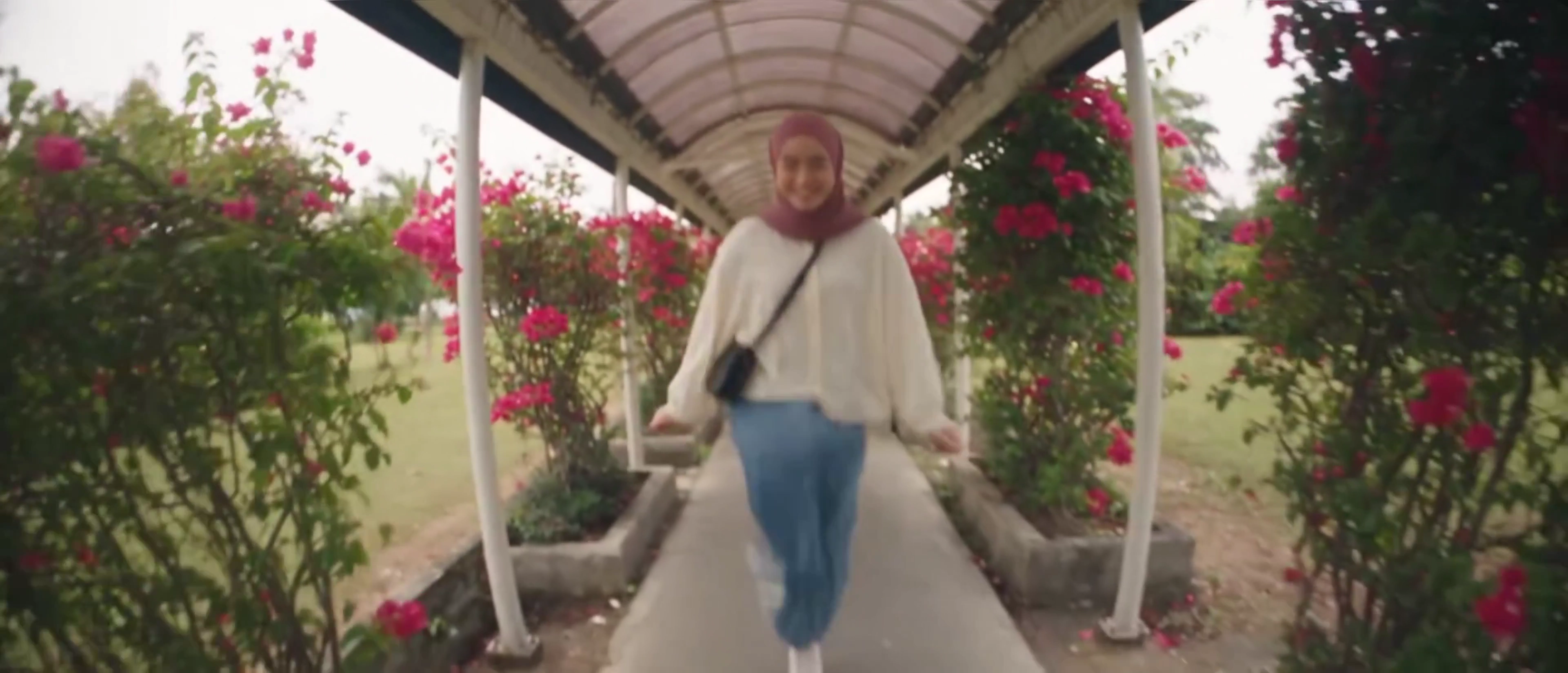 Mauve Hijab Vlogger Devours Roti Canai Under Neon City Glow