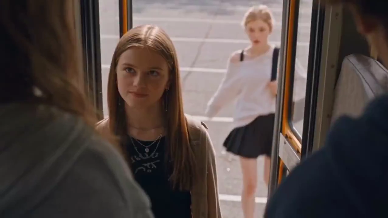 Supernatural Glow Ignites as Girl Runs Beside Moving School Bus