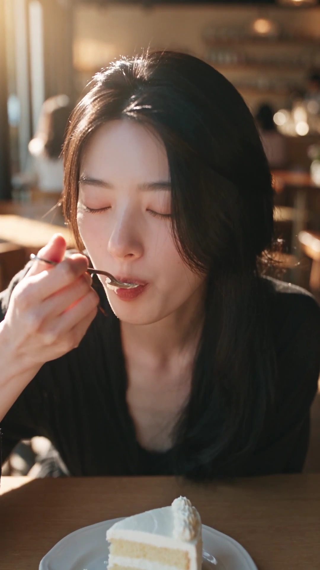 Sunlit Café: A Woman's Surprised Gasp as Napkin Wipes Cream